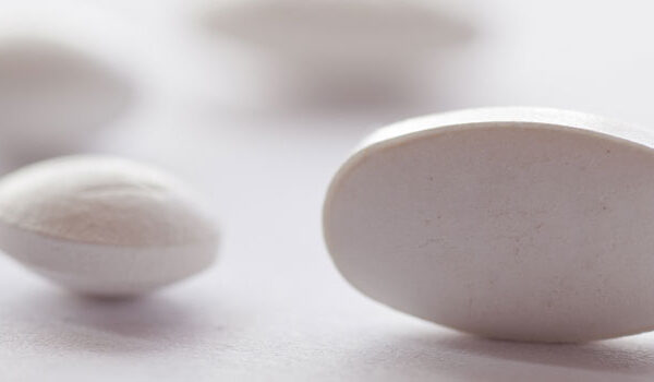 What is the placebo effect and how can it be used to help patients?